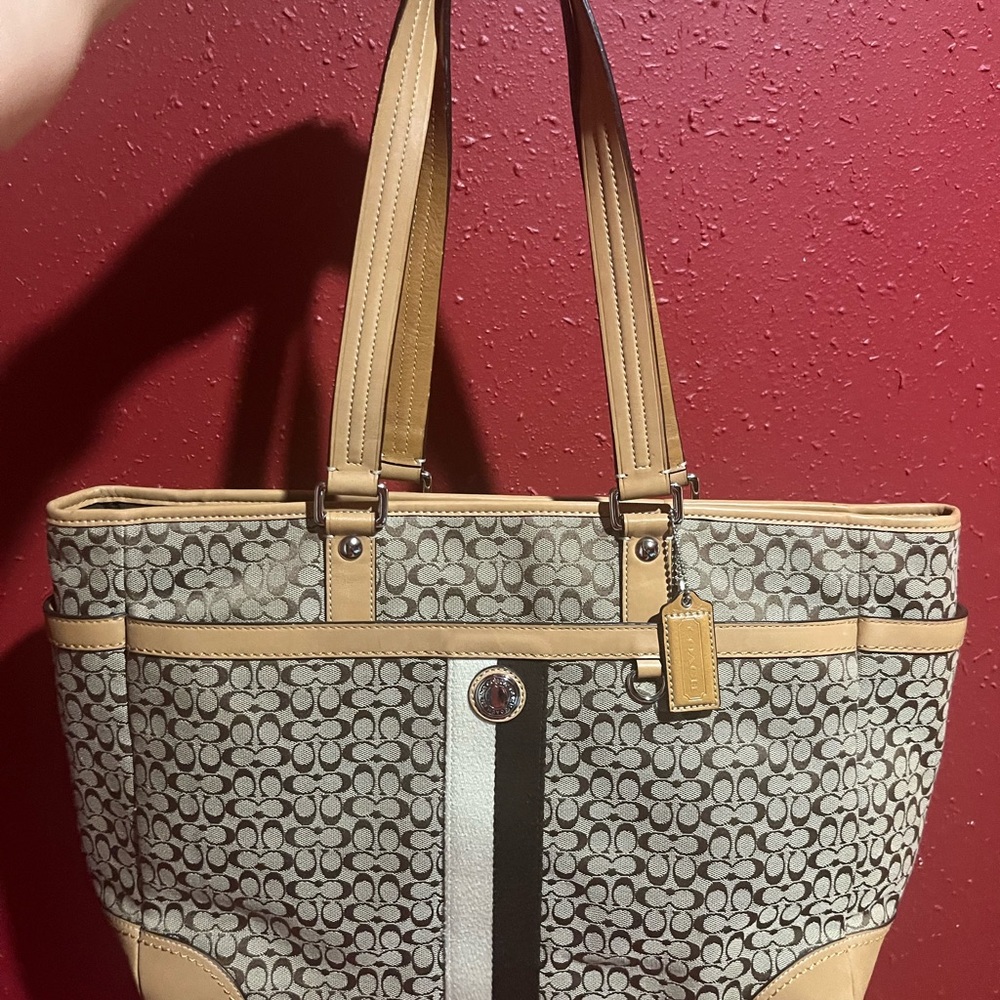 Coach Signature Canvas Voyager